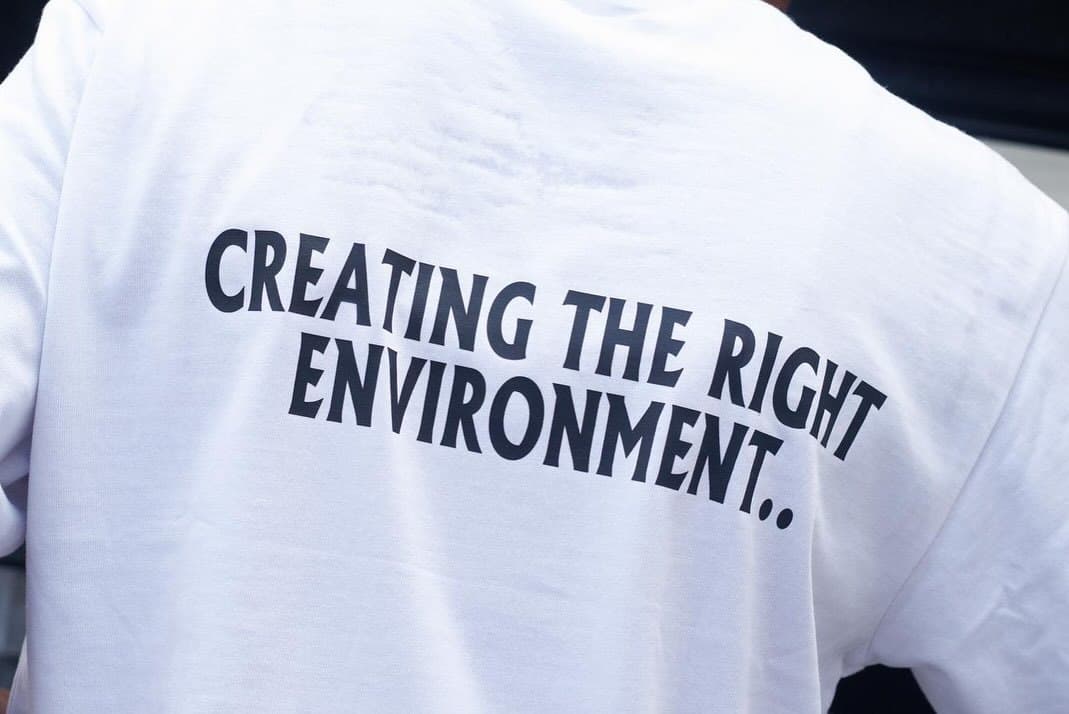 White Freekick tee — Creating the right environment